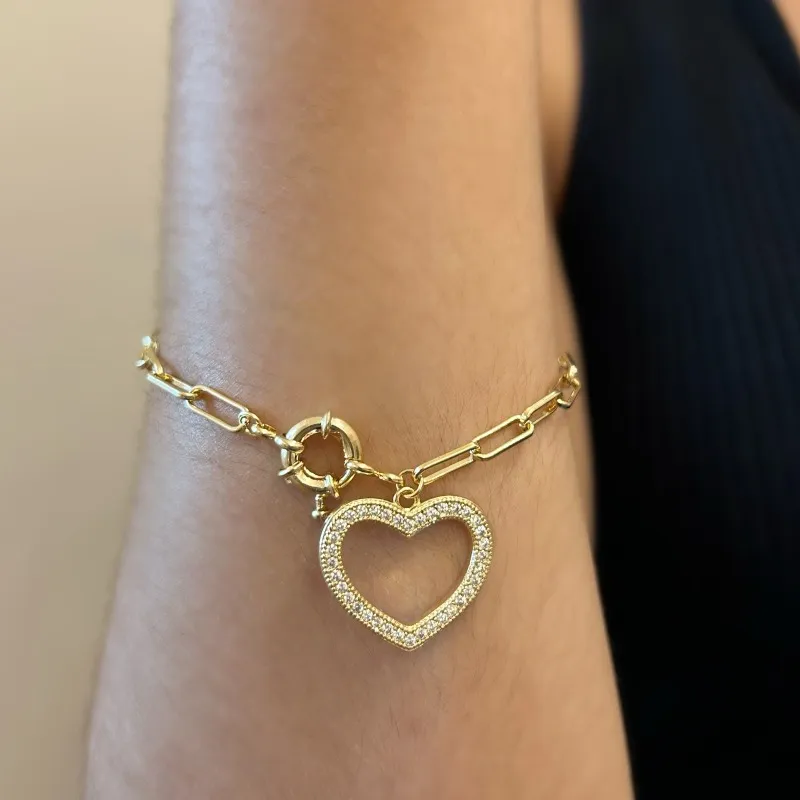 PULSEIRA CARTIER COM CORAÇÃO VAZADO E CRAVEJADO PENDURADO